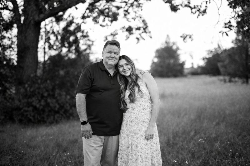 Father and daughter in the field